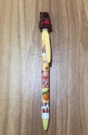 Caneta Amarela com Capivara na ponta Segurando uma Fruta