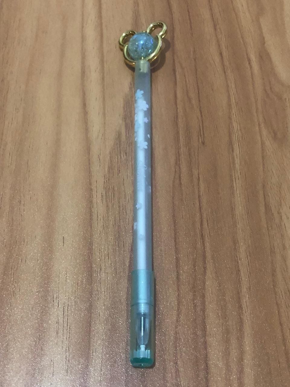 Caneta ponta Urso com esfera Giratória verde