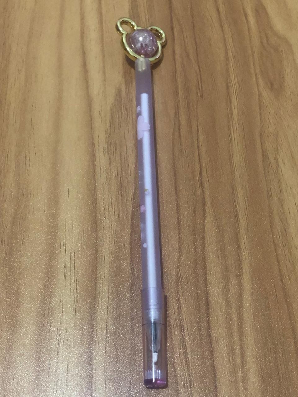 Caneta ponta Urso com esfera Giratória roxa