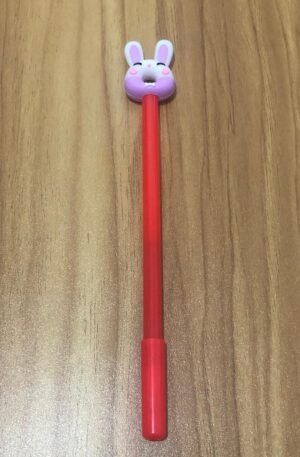 Caneta ponta Coelho formato Donuts roxa/branco