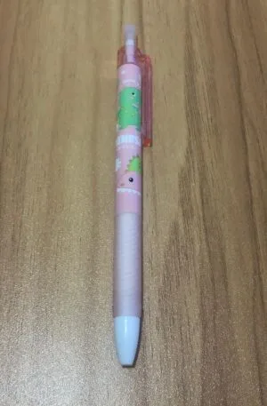 Caneta estampa dinossauro rosa claro